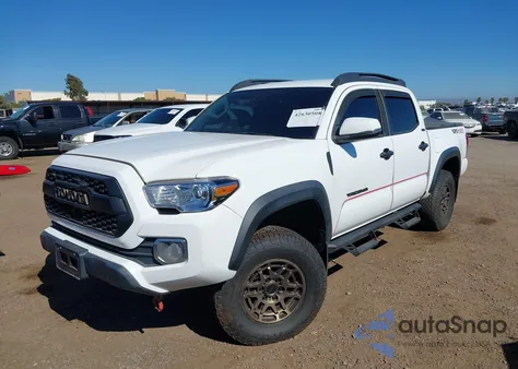2023 Toyota Tacoma Trail Edition from USA, damaged, VIN 3TMCZ5AN9PM566482